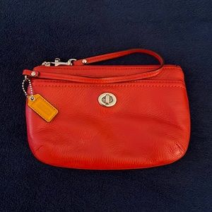 Coach bright red/coral wristlet